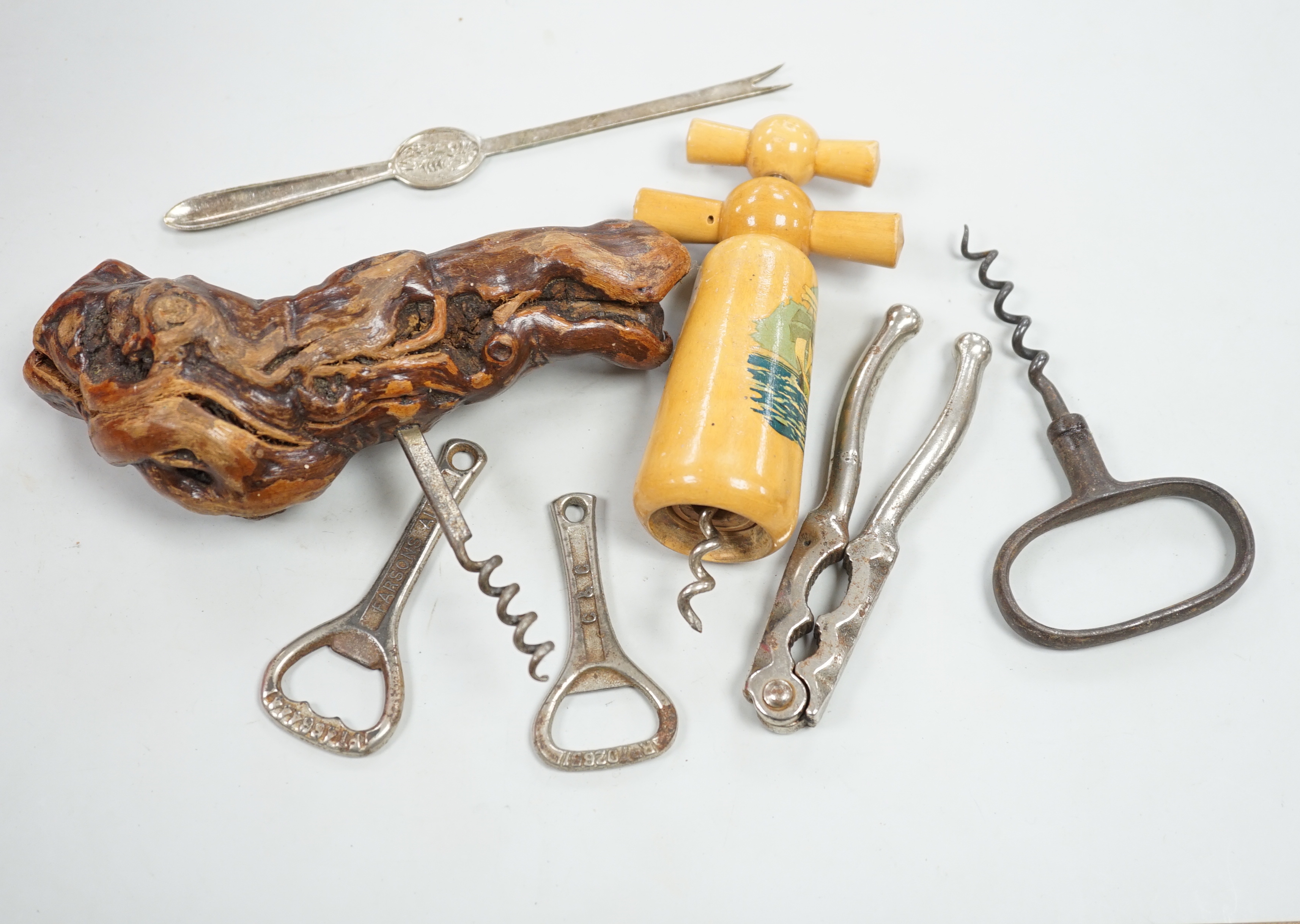 A collection of various corkscrews, bottle openers etc.